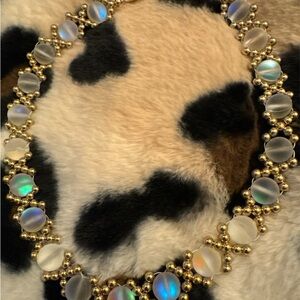 Elegant Gold and Iridescent Necklace